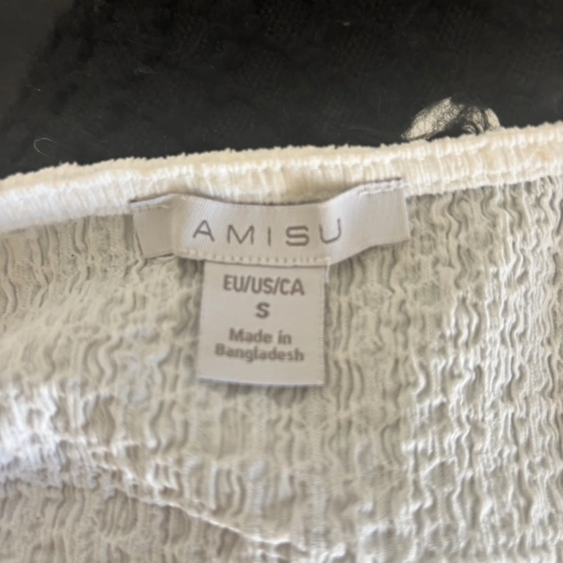 Vit smockad blus från Amisu - 2