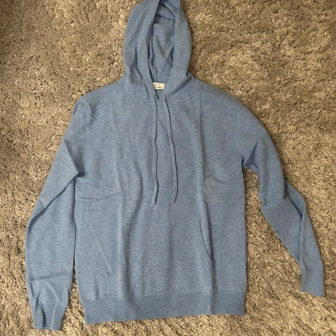 Blå Kashmir hoodie med huva och snörning