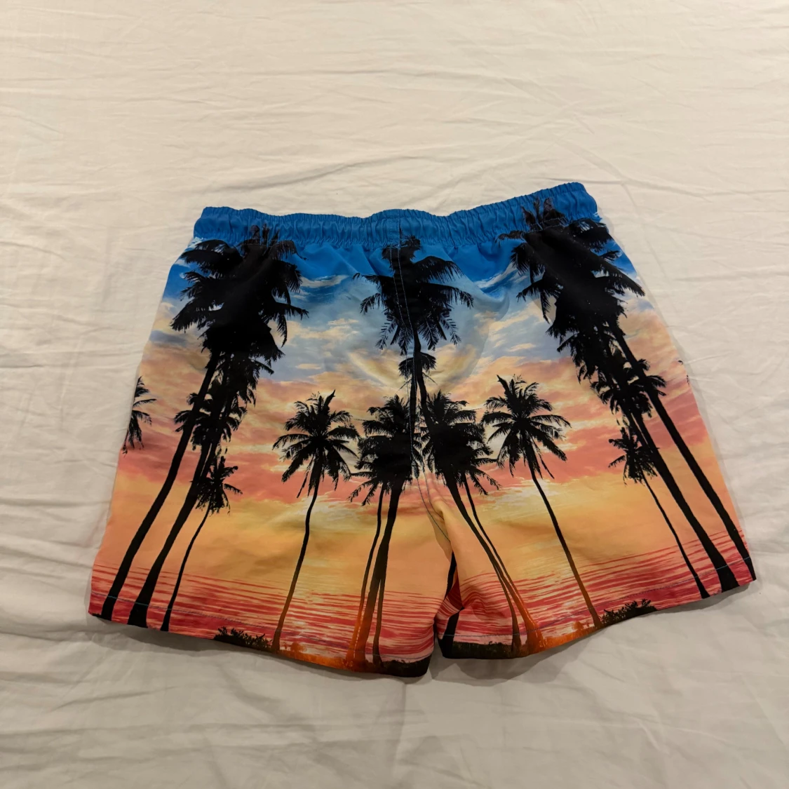 Färgglada badshorts från Calliope - 1