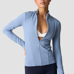 Ljusblå långärmad ziptröja från ICIW - Ljusblå långärmad half zip från ICIW. Medellen heter Nimble 1/2 Zip Long Sleeve och ordinarie pris är 799kr. Aldrig använt och lappen är kvar!😊 