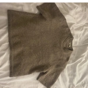 Tre kvart ärmar tröja  - En fin stickad tröja i ett mycket bra skick.