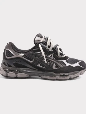 Svarta ASICS Gel-nyc sneakers - Snygga svarta ASICS Gel-nyc sneakers med grå och silvriga detaljer. Ovandel i mesh och syntet för bra andningsförmåga och komfort. Tjock, dämpad sula och klassisk snörning. Perfekta för dig som gillar sportig och trendig stil.