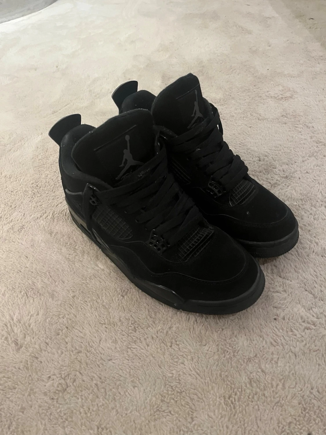 Svarta Nike Jordan 4 sneakers