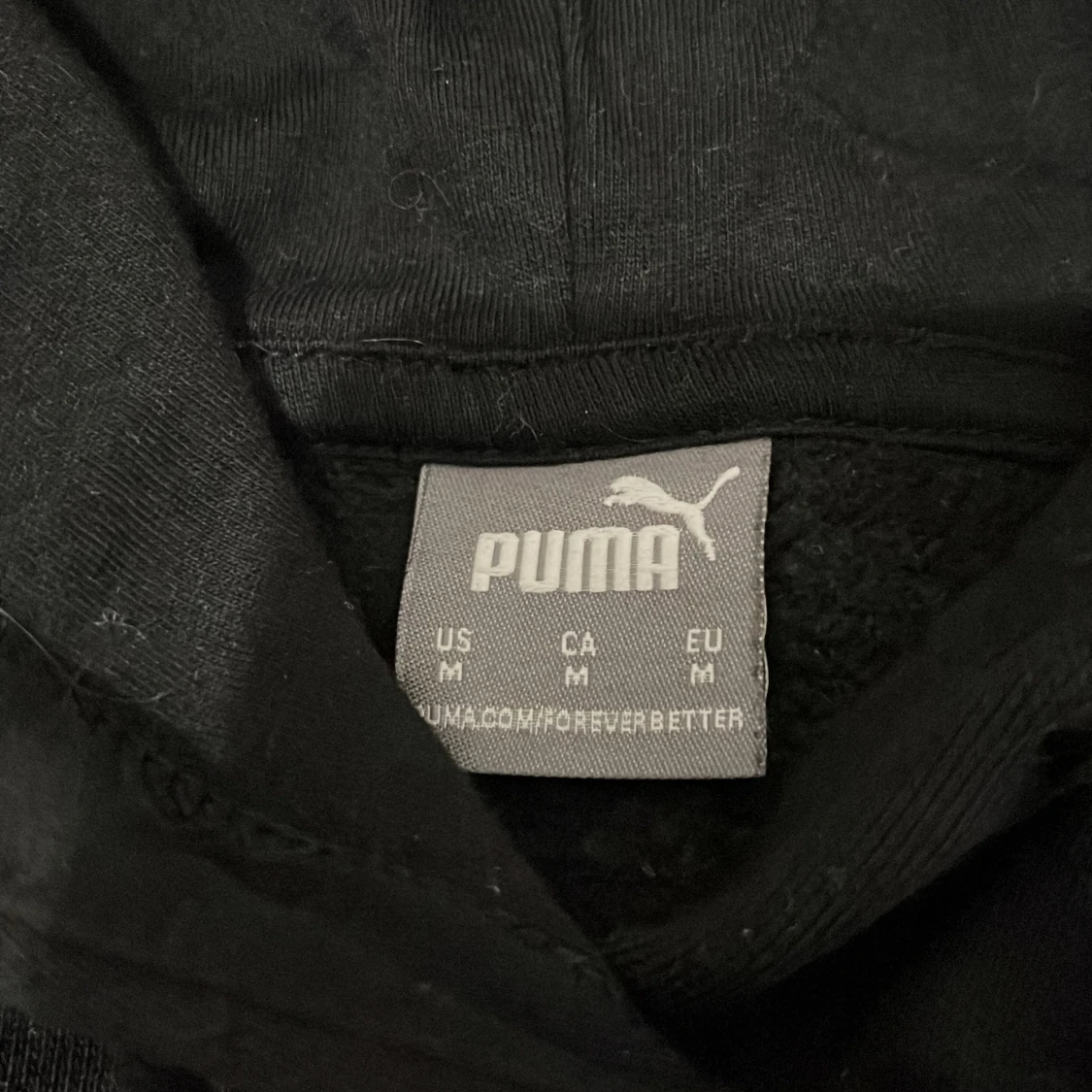 Svart hoodie från Puma med leopardtryck - 2
