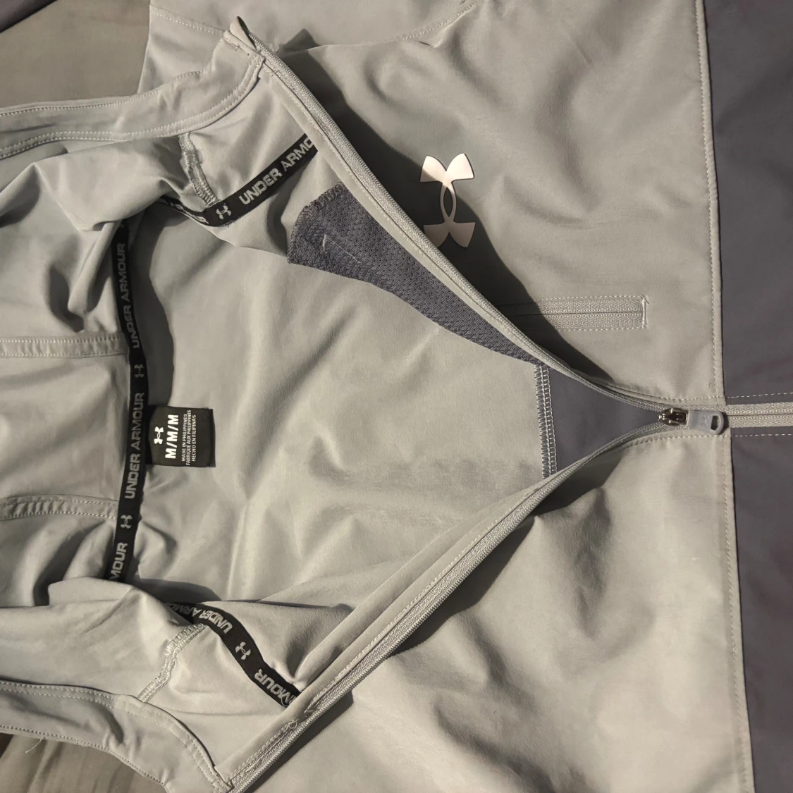 Grå vindjacka från Under Armour M - 1