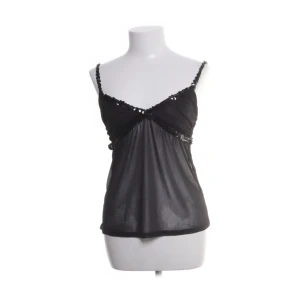 Svart festtopp med paljätter - Knappt använd, storlek XS 