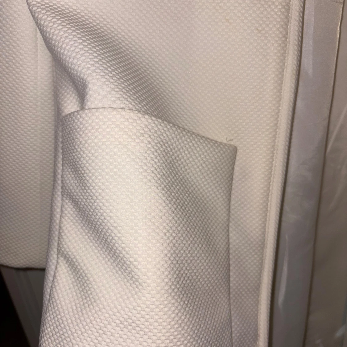 Vit strukturerad kappa med fickor - 1