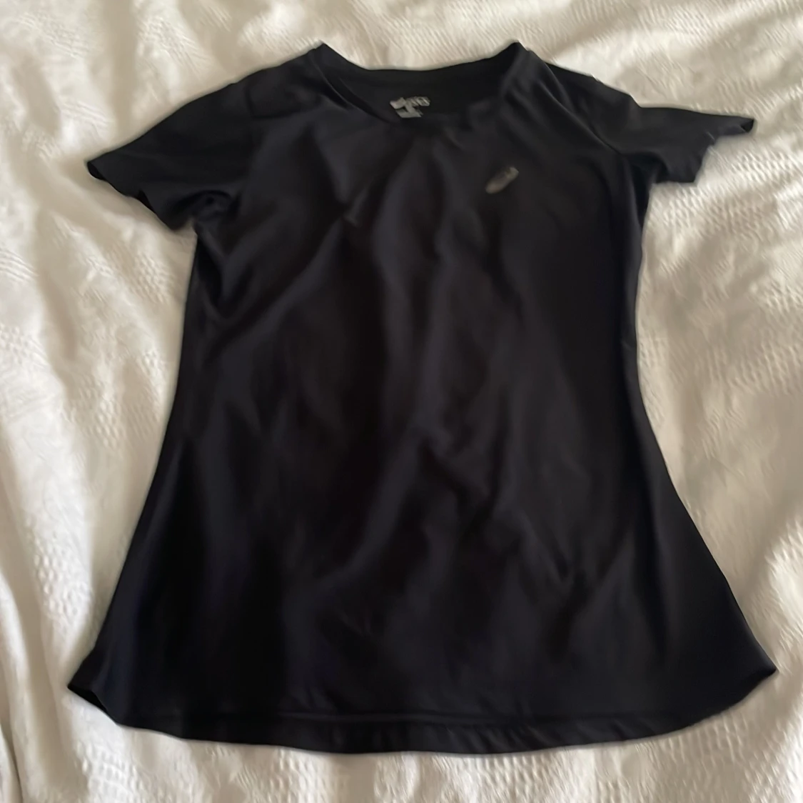 Svart träningst-shirt från Asics XS