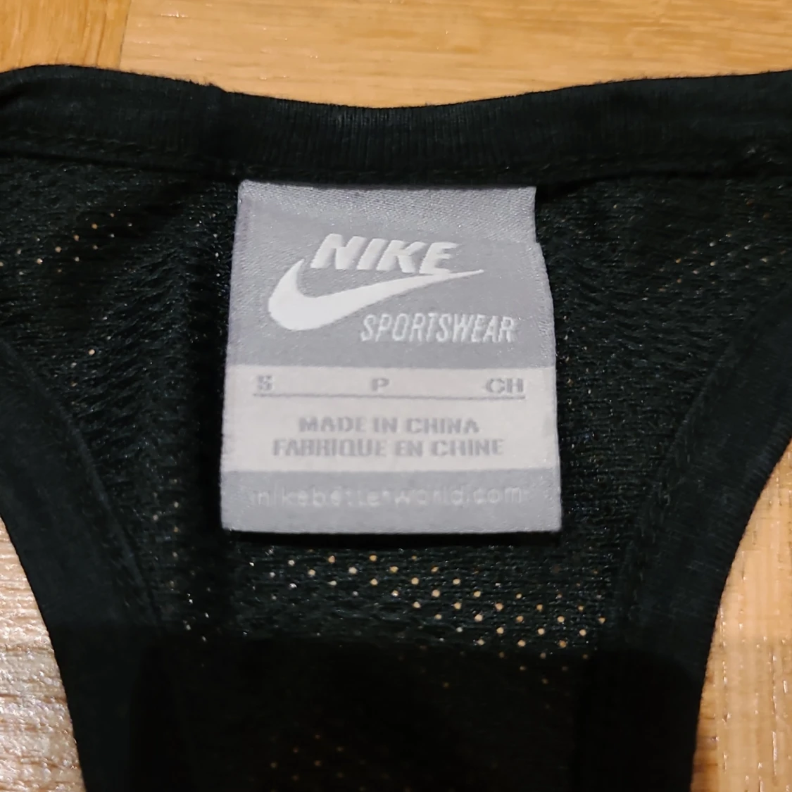 Svart linnetopp från Nike med tryck - 1