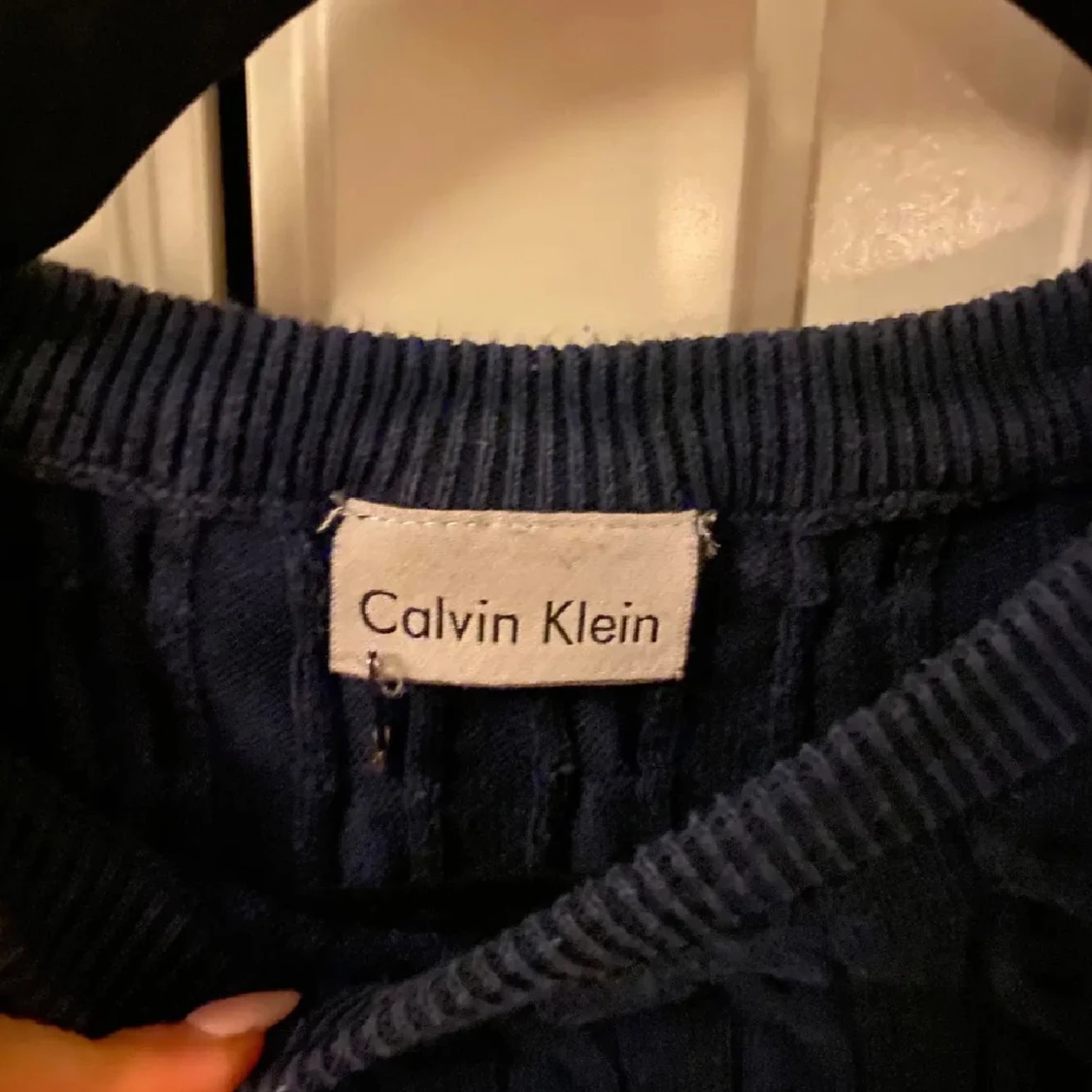 Mörkblå stickad tröja från Calvin Klein - 1