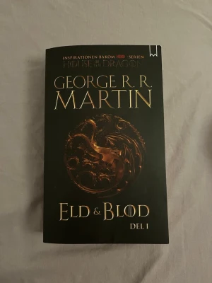 Eld & Blod bok - Säljer då den inte kommer till användning. Bokmärket följer med! 
