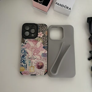 Två mobilskal med unika designer - Säljer två snygga mobilskal, säljer då jag köpt en ny telefon. Dem passar iPhone 13 PRO. Köp tillsammans eller enskilt.  1= 120 kr 2=210 kr