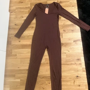 Jumpsuit brun  - Oanvänd 