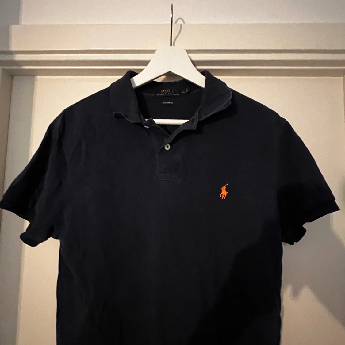 Svart pikétröja från Ralph Lauren