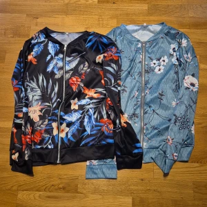 Tunna zipjackor - 2 st Zipjackor i blommiga mönster stl 2xl men är mer som xl. 50 :-/styck
