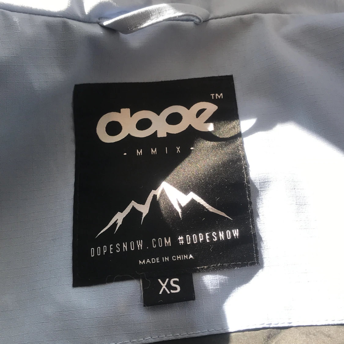 Ljus blå dope jacka storlek xs.