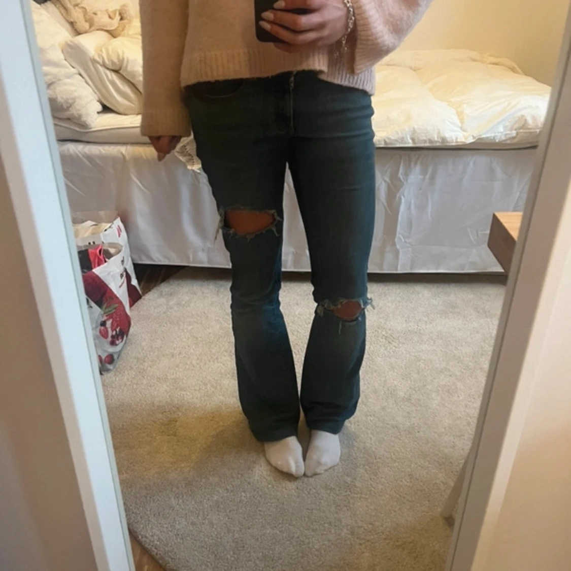 Blå jeans med slitningar - 1