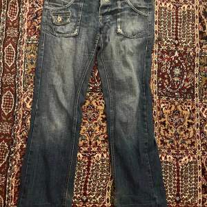 Lite baggy / bootcut Coola fickor  38/40