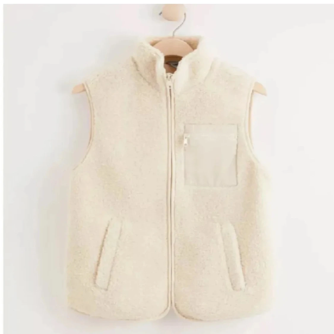 Beige teddy väst från Lindex 