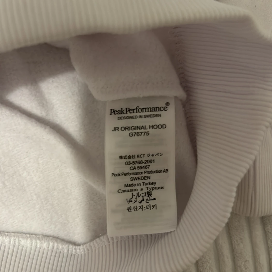 Vit hoodie från Peak Performance - 91