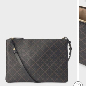 BY MALENE BIRGER IVY PURSE - Snygg och stilren axelväska i mörkbrunt med ett diskret rutmönster. Väskan har en praktisk dragkedja i guld och en justerbar axelrem. Perfekt för både vardag och fest!köpt i butik. Kvitto samt dustbag finns till. Använd Max tre gånger. Inga defekter.  Så gott som ny! Hör av dig vid intresse eller frågor💕💕 pris kan diskuteras!