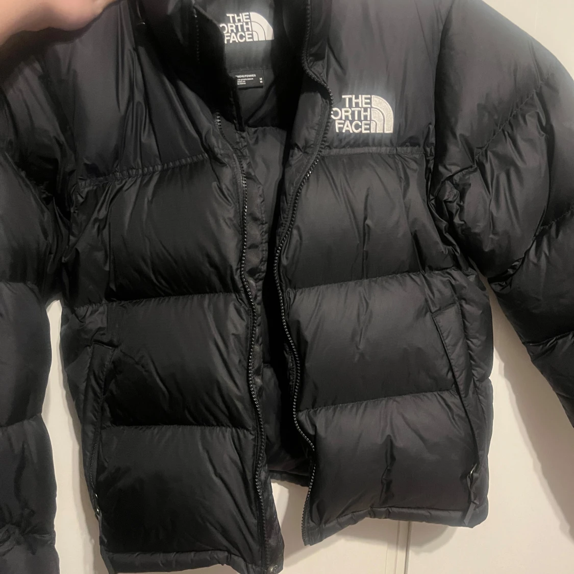 Svart dunjacka från The North Face