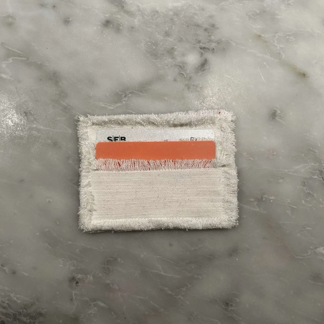 Vit jeanskorthållare