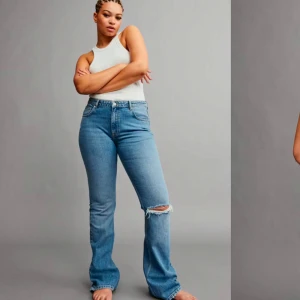 Blå jeans med slitna detaljer - Säljer dessa jeansen från ginatricot. Fint skick men använda några gånger! 