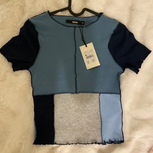 Tshirt - Köpte för länge sedan men den kom aldrig till användning. Prislapp finns kvar.