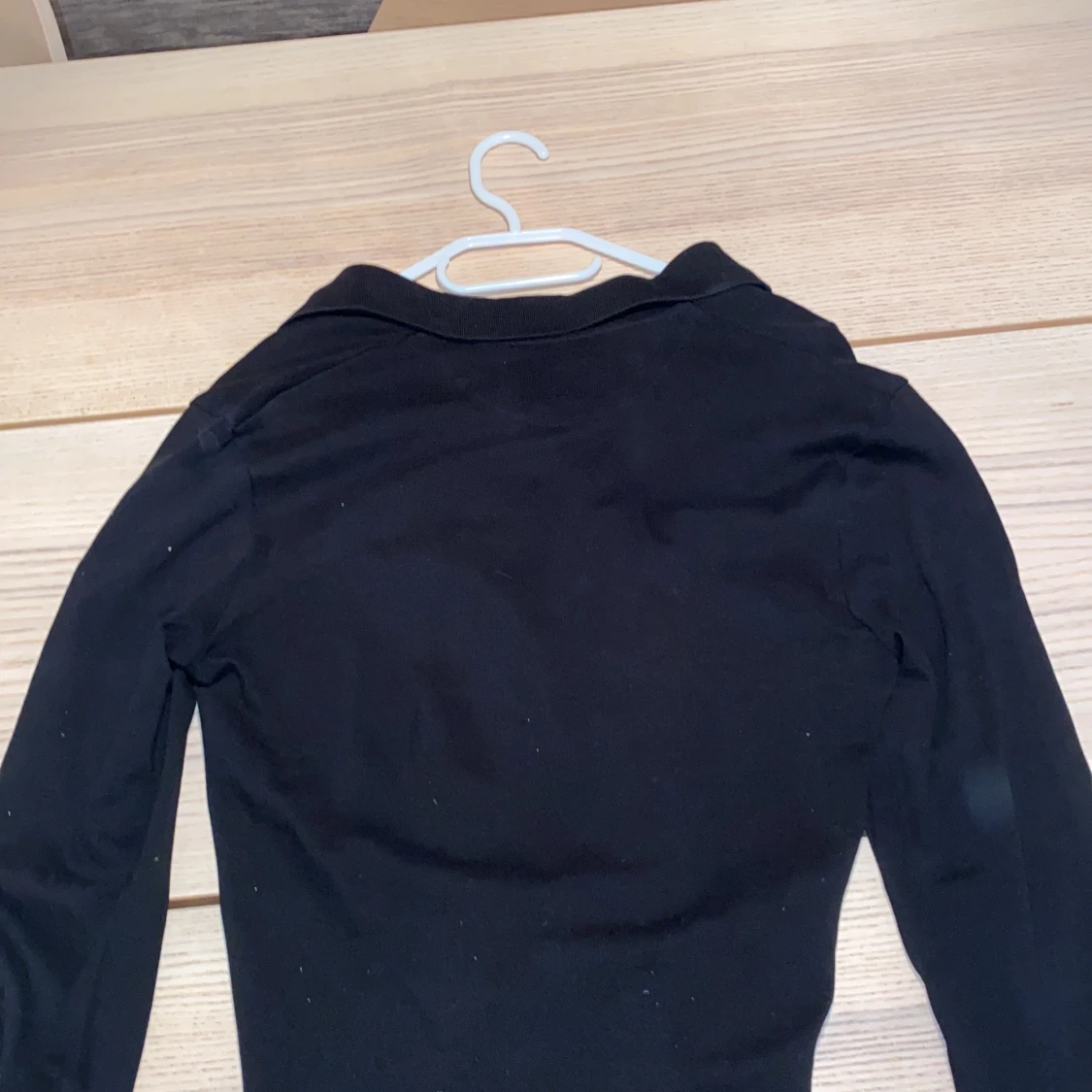 Svart pikétröja från Lyle & Scott - 91