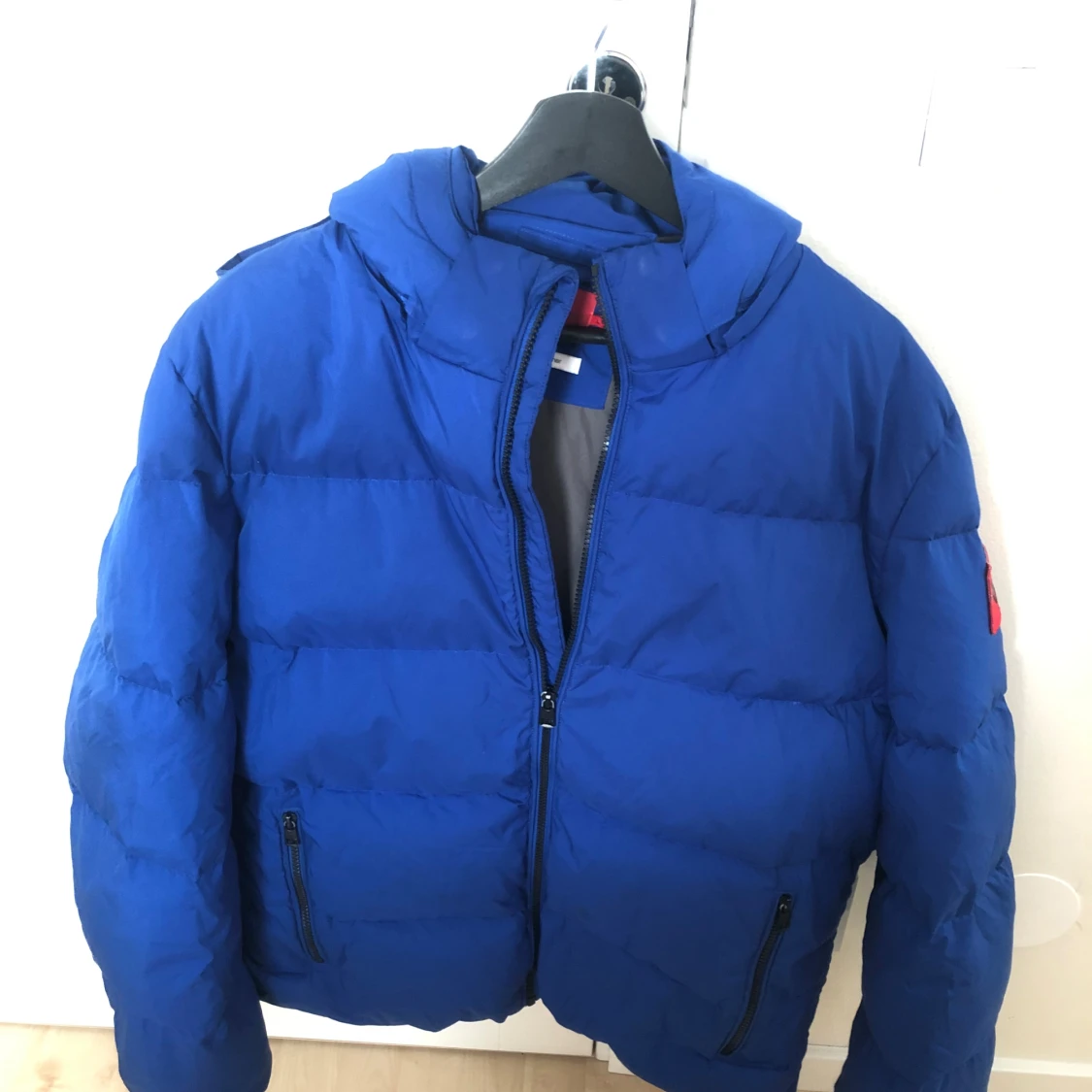 Blå pufferjacka från Calvin Klein - 91