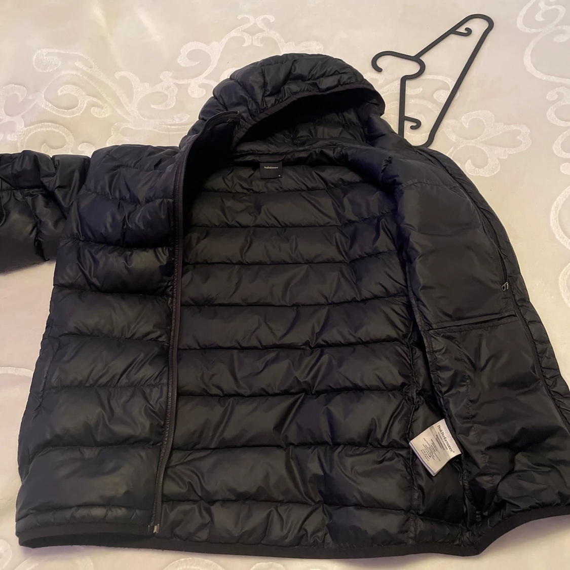 Svart dunjacka från Peak Performance - 90