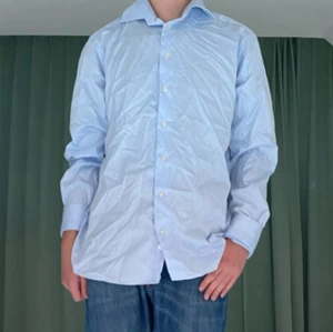 Blå Eton skjorta  - Bra skicka,Slim fit. 