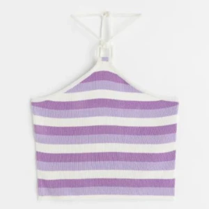 Halterneck topp - Helt ny halternecktopp från H&M med prislapp fortfarande kvar. Köpt för 149kr och säljer för 40kr, helt slutsåld på hemsidan. 