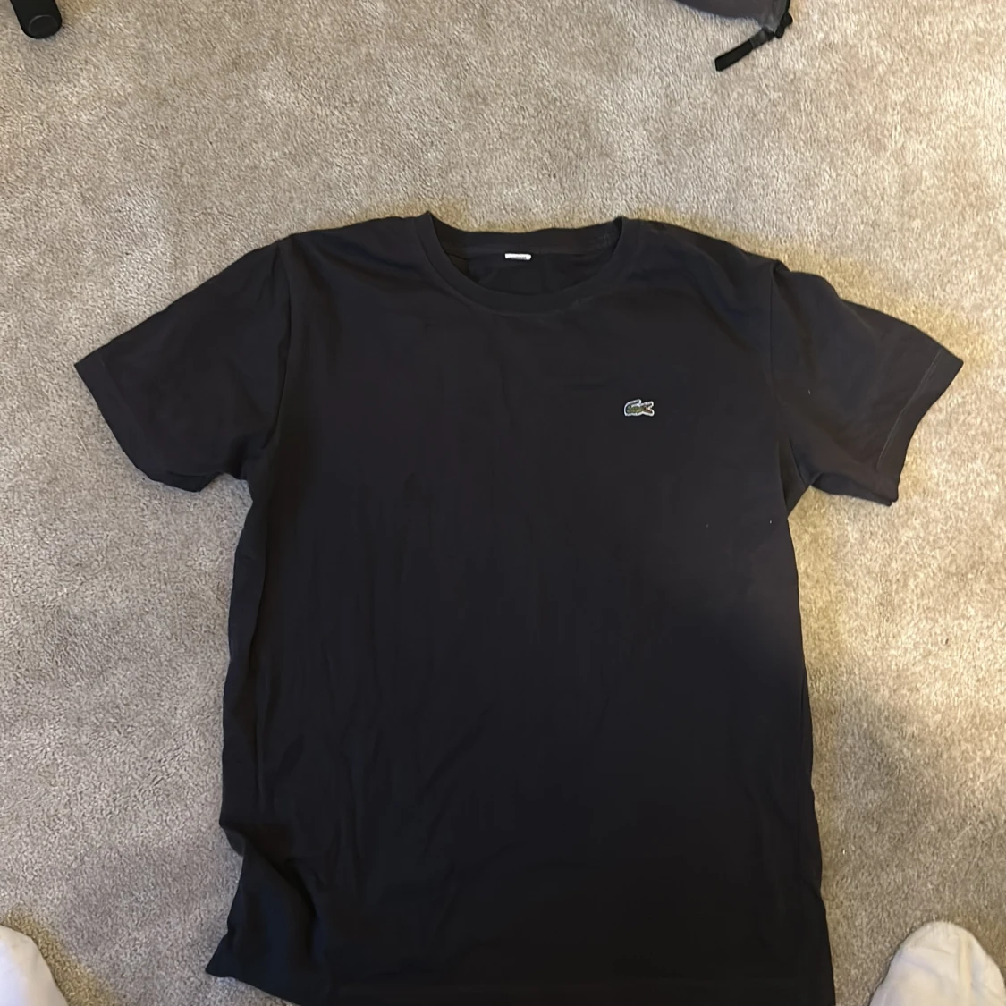 Svart t-shirt från Lacoste