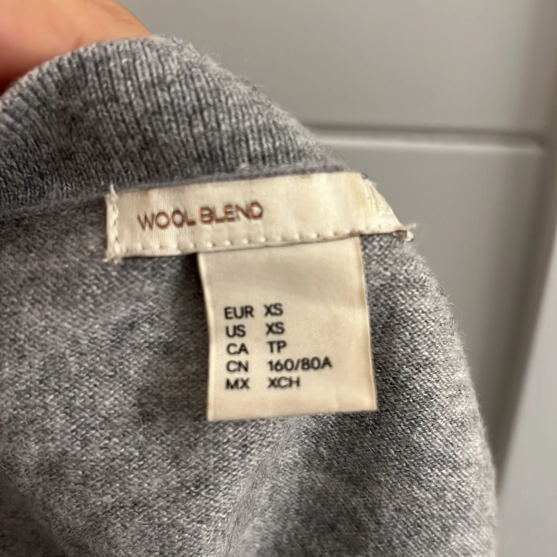 Grå tröja i ullblandning - 90