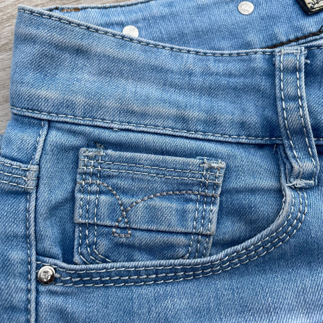 Ljusblå lågmidjade jeans - 92