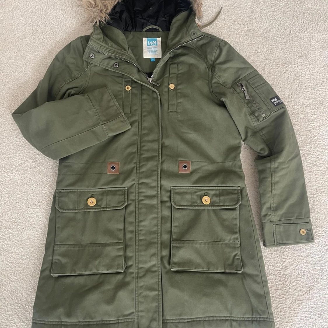 Grön parkajacka från WA Action Sports