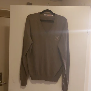 Helt ny tröja, Grandslam,storlek Medium,  70% Bomull 30% Lamm Ull, Pris 250kr - Tröja Grand Slam, Helt Ny aldrig använt,  Pris 250kr