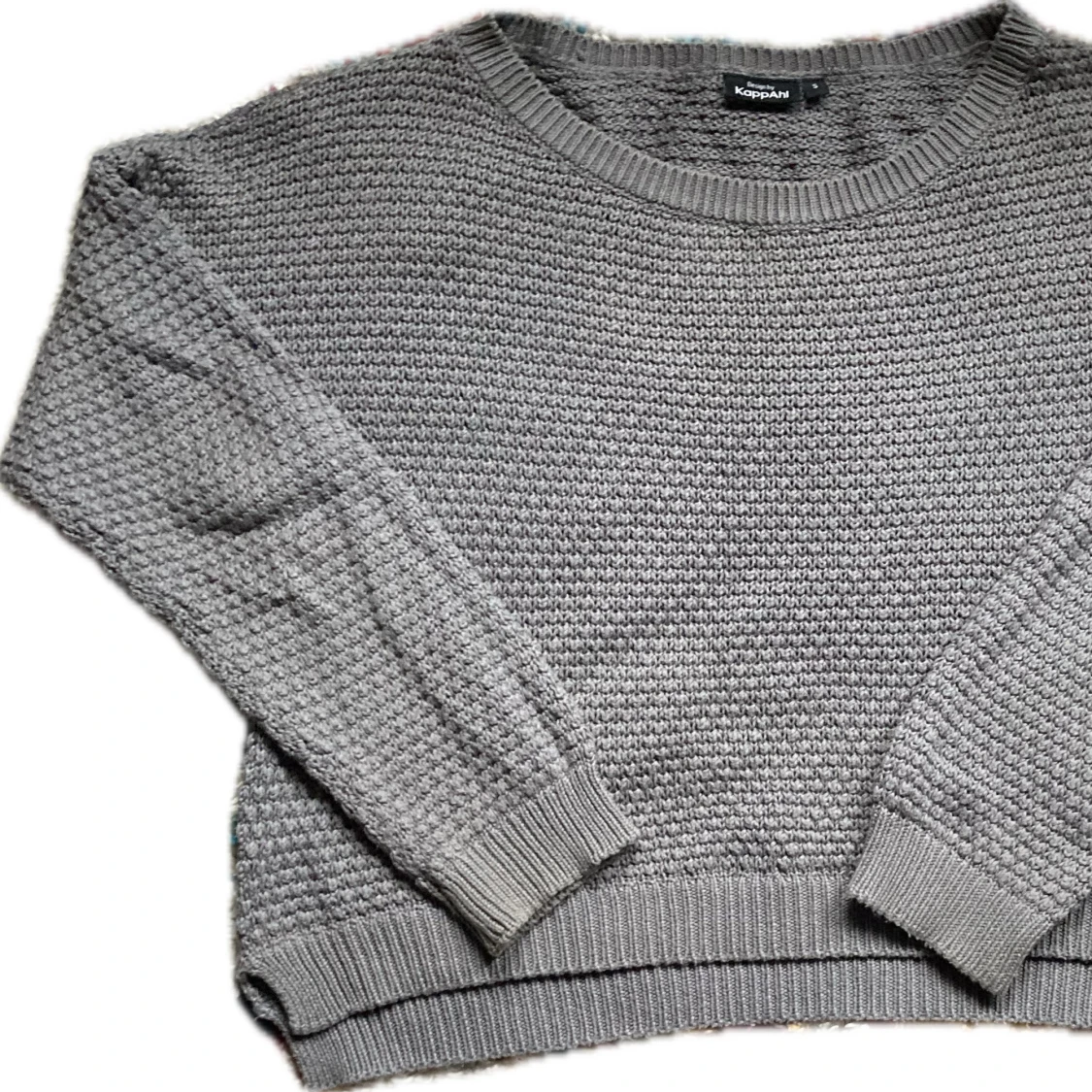 Grå stickad tröja från KappAhl