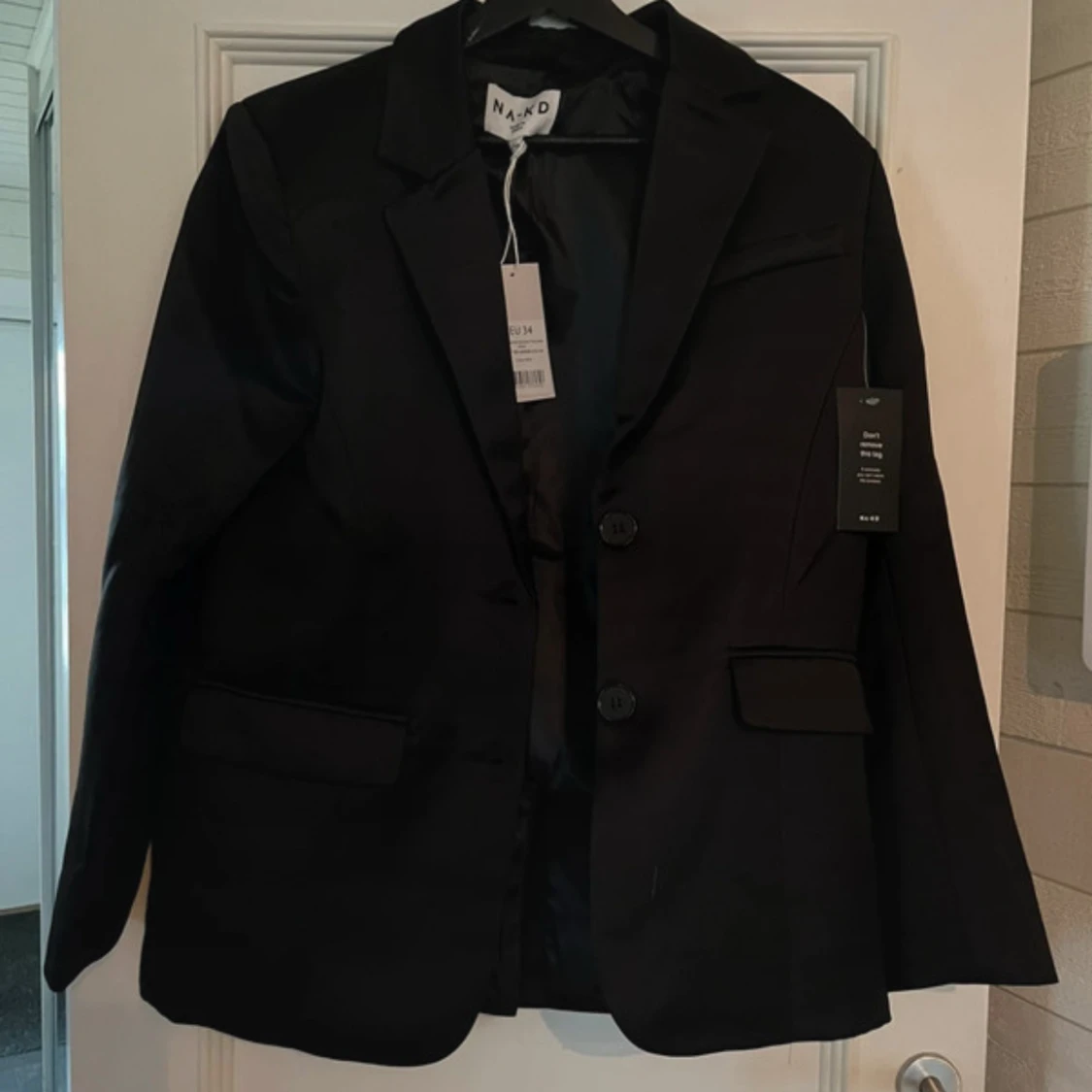 Svart kavaj från NA-KD storlek 34