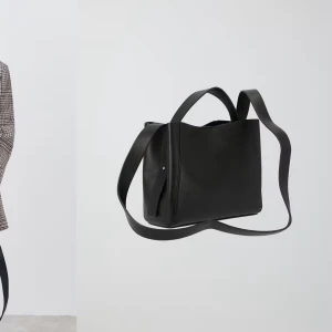 Svart axelväska i skinn från Gina Tricot  - Snygg och stilren svart axelväska i skinn. Perfekt för både vardag och fest. Väskan har en enkel design med en bred axelrem för bekväm passform. Den är rymlig nog för att få plats med alla dina nödvändigheter. Det är i ett väldigt bra skick då den endast är använd ett par gånger.💓