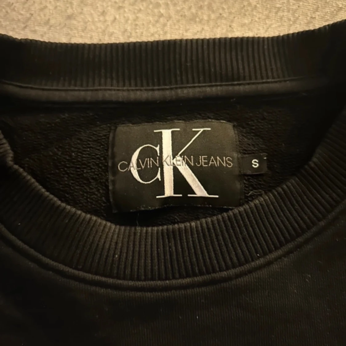 Svart tröja från Calvin Klein Jeans med tryck - 91