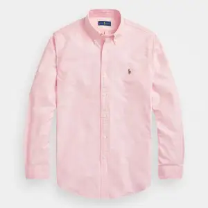 Säljer en snygg rosa skjorta från Ralph Lauren. NYRPIS RUNT 1600kr . Pris kan självklart diskuteras