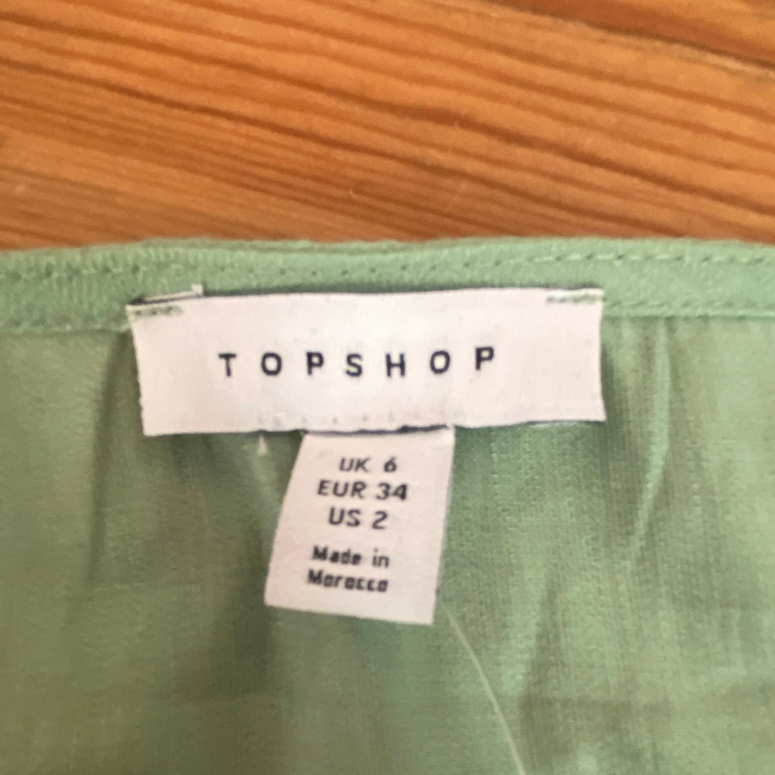 Grön blus med knytningar - 91