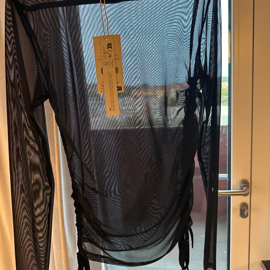 Svart Genomskinlig långärmad tröja  - 90