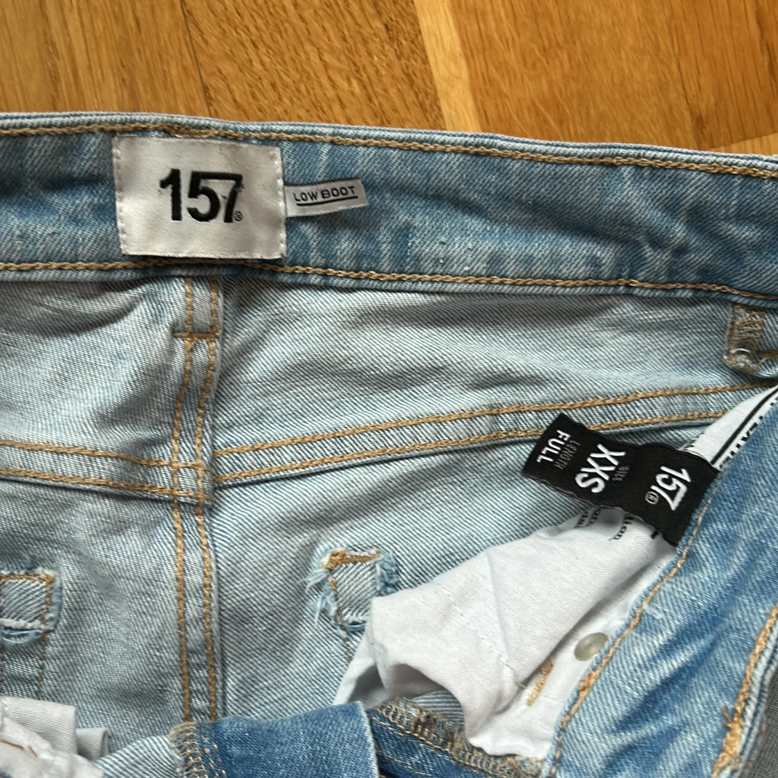 Ljusblå bootcut jeans från 157 - 2