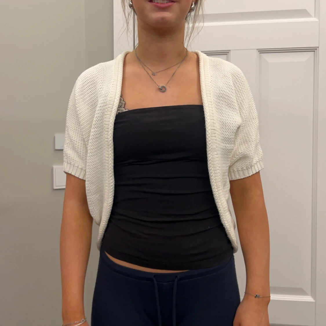 Vit stickad bolerotopp