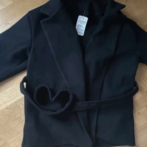 Svart kappa - Onesize men passar mig bra som har xs/s annars 