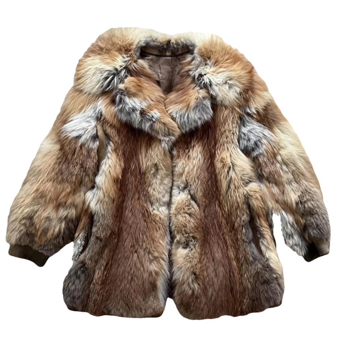 Fluffig pälsjacka i naturliga toner